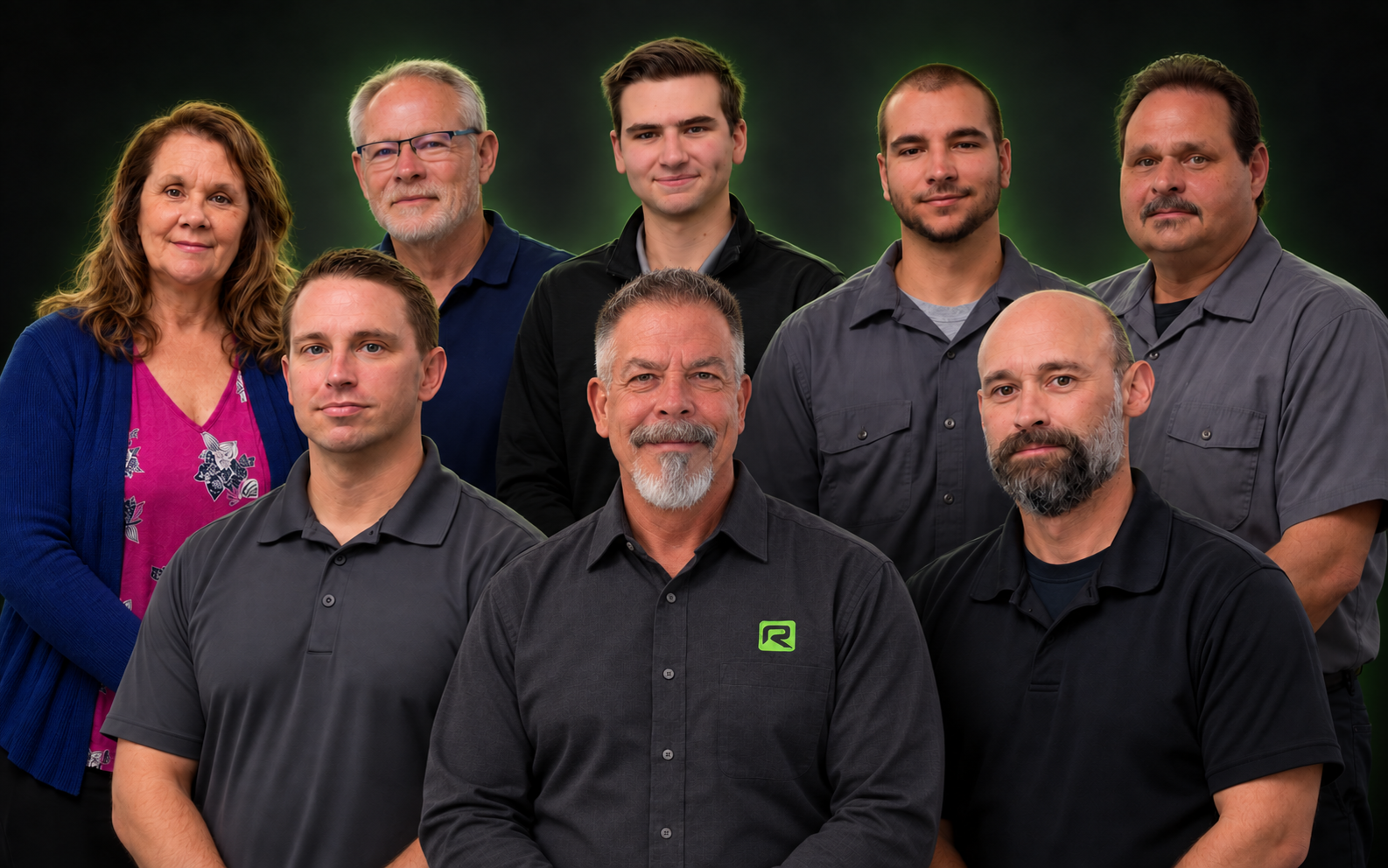 Roberts Mechanical team portrait: Grant in front, Ryan and Rico behind him, with Mary, Ric, Louie, Nick, and Don in the back row